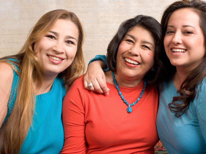 three women smiling