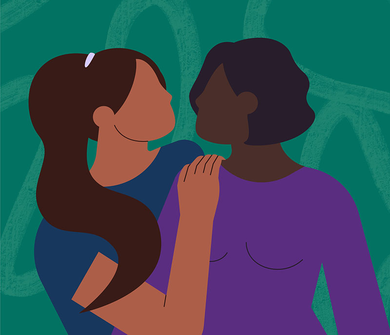 Illustration of two women over a dark green background. The woman on the left has long brown hair in a ponytail and brown skin, and is wearing a dark blue top. She is hugging the woman on the right, a black woman with short black hair who is wearing a dark purple top.