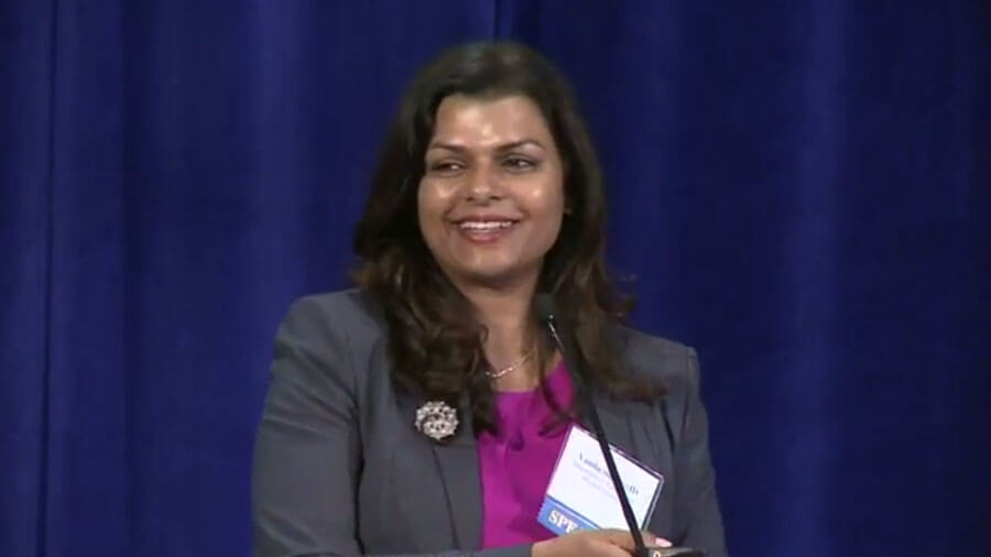 Vanila M. Singh, M.D., MACM, addresses meeting attendees